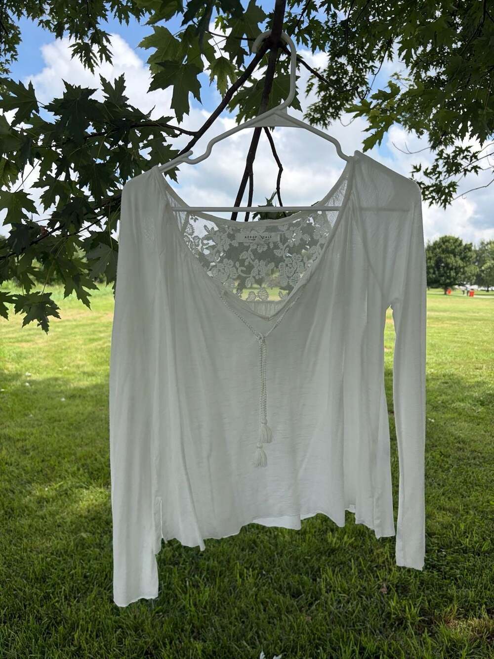 Y2K authentic Aéropostale White Long Sleeve V-Neck Top with Lace Back Tassels